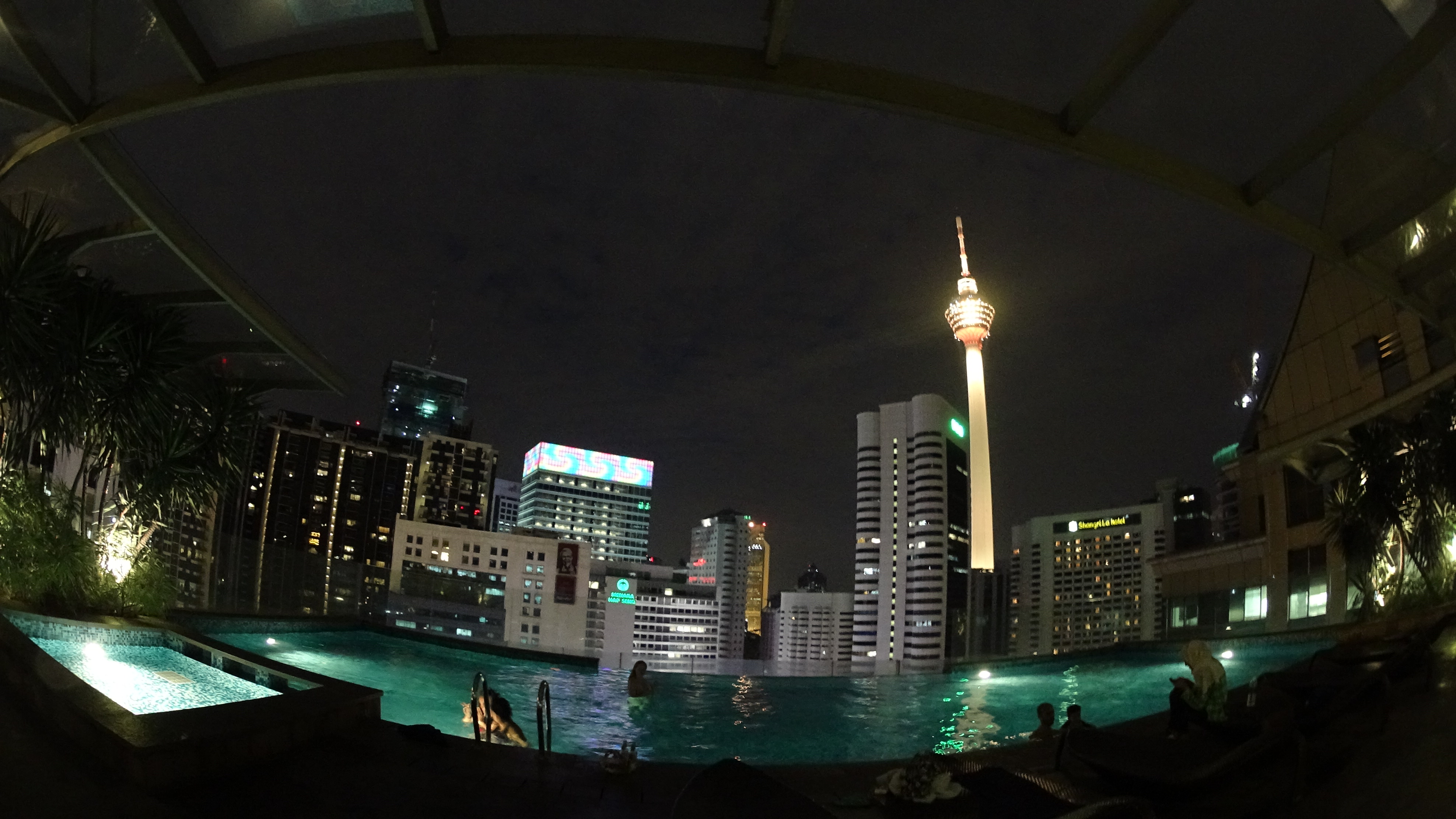 Fraser Place Roof -top Infinity Pool at night.